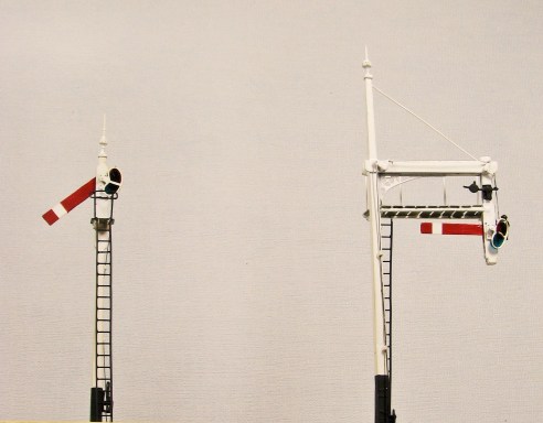 Gallows bracket to the right, restored from the John H Wright original.  The simple post signal is all mine!